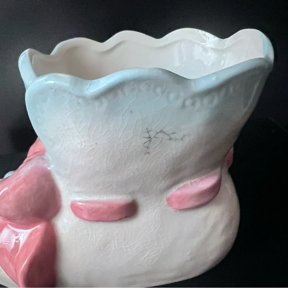Vintage ceramic baby bootie vase